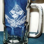 Rose etched in a glass beer mug.