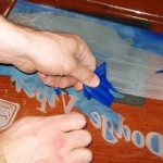 Using a vinyl cut stencil for sandblasting.