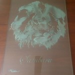 A lion etched 1/4 inch deep by sandcarving.