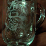 Rotary engraved cat on glass mug.