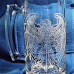 A mug etched with a Dremel rotary tool of an eagle.